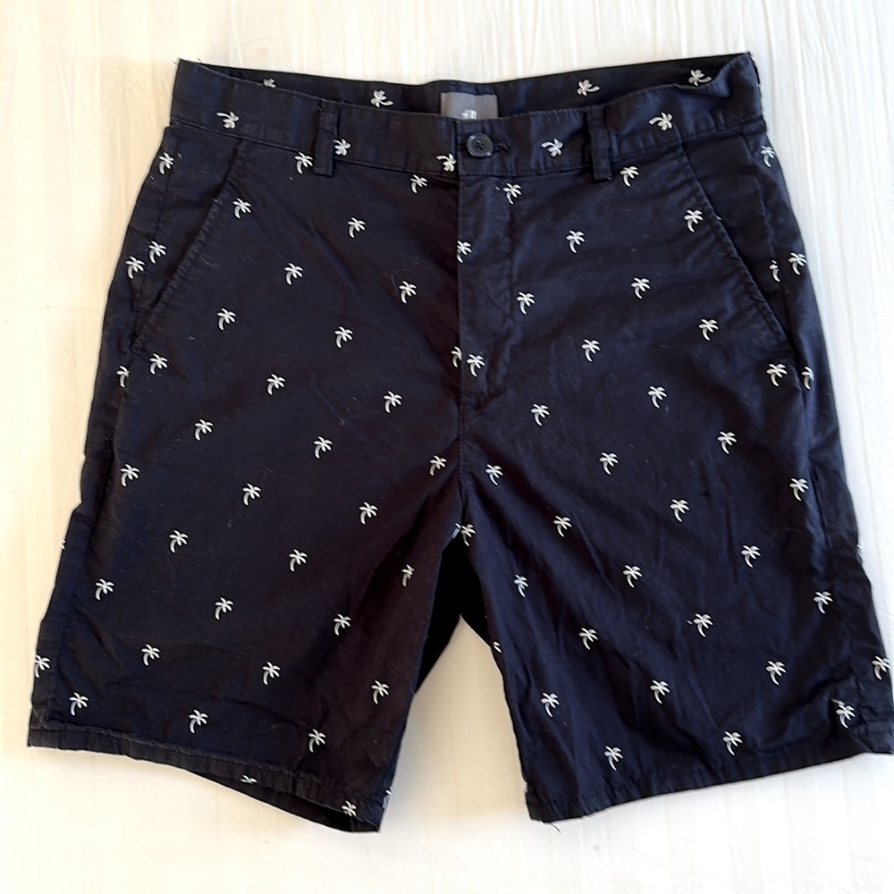 H&M men’s chino shorts. Navy with palm tree motif